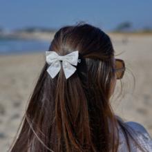 Bow tie hair slide white sequined