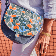 Flap of small shoulder bag kumquat party