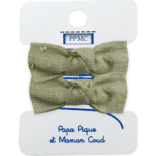 Small elastic bows almond green with golden dots gauze
